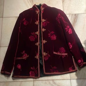 Size small burgundy, and gold rose jacket with a real fur lining reversible